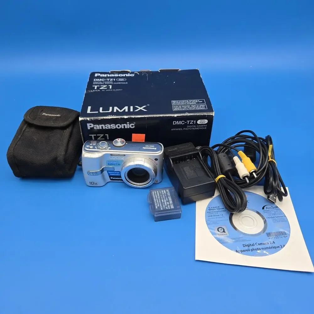Panasonic Lumix DMC-TZ1 Silver 5MP Digital Camera 10x Zoom Tested Boxed